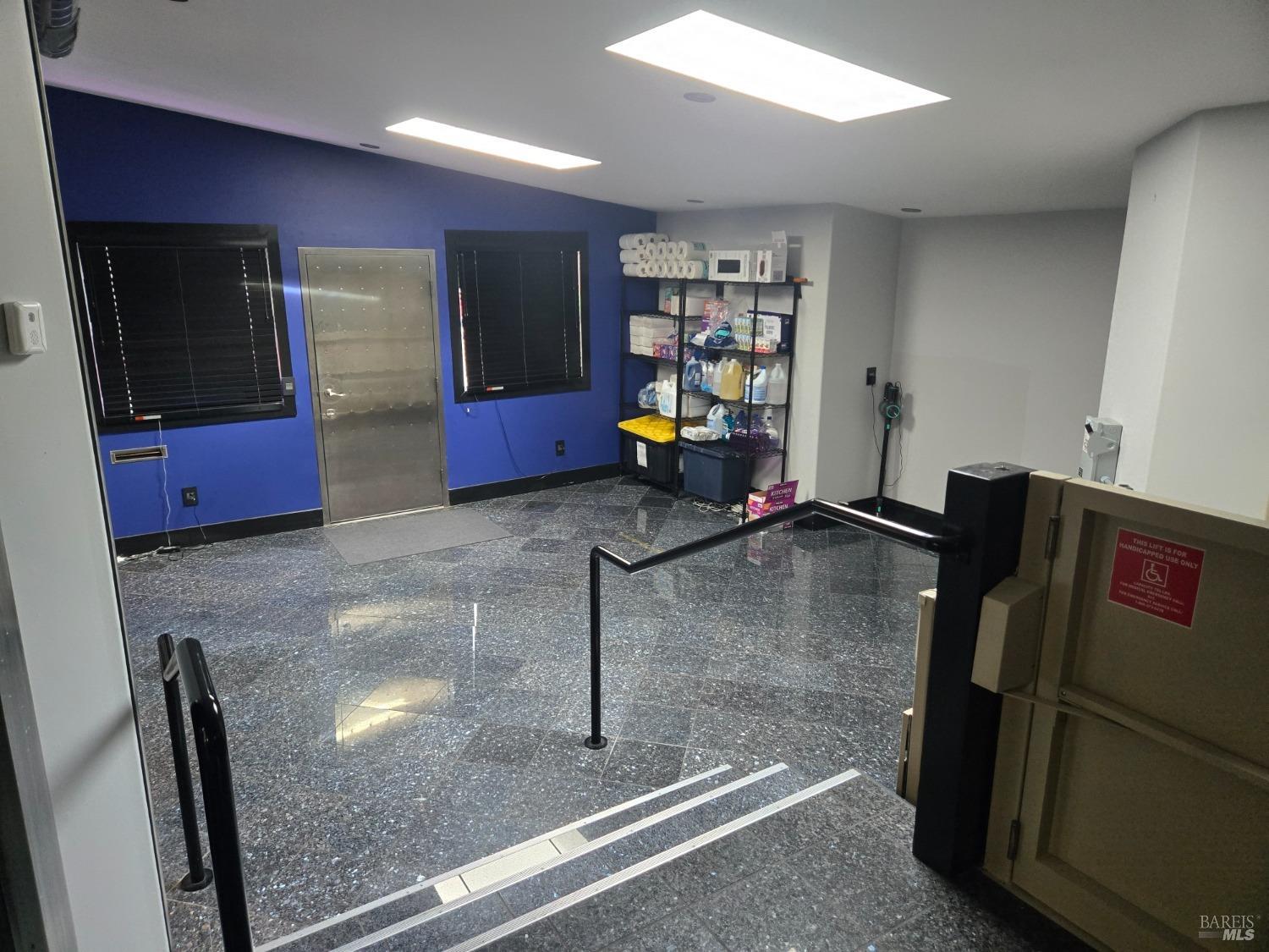 1510 4th Street Santa Rosa, CA 95404 - Photo 7 of 15 a kitchen with stainless steel appliances granite countertop a refrigerator and a counter top space