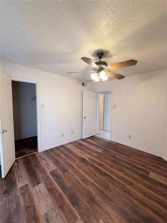 18333 Roehampton Drive, Unit 622 Dallas, TX 75252 - Photo 19 of 28 a view of a room with a ceiling fan