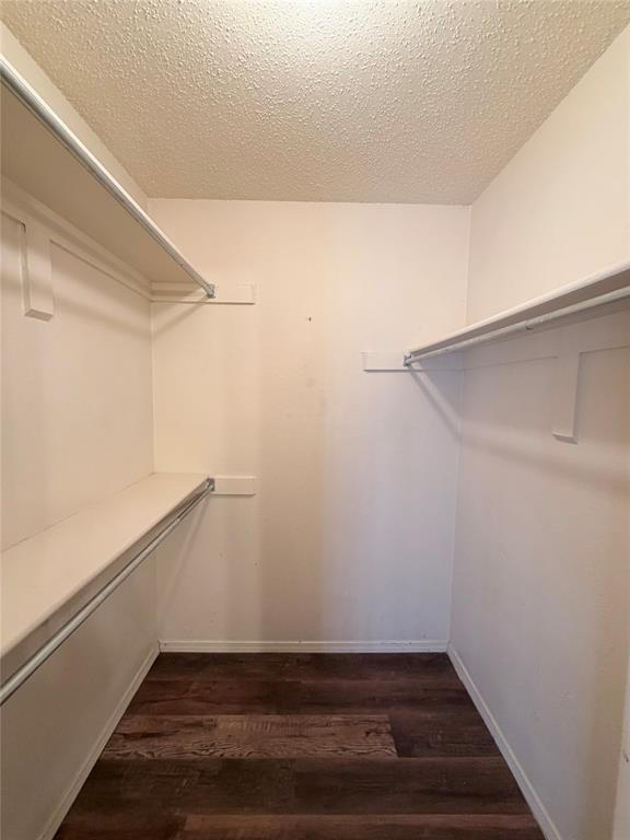 18333 Roehampton Drive, Unit 622 Dallas, TX 75252 - Photo 20 of 28 a view of an empty walk in closet