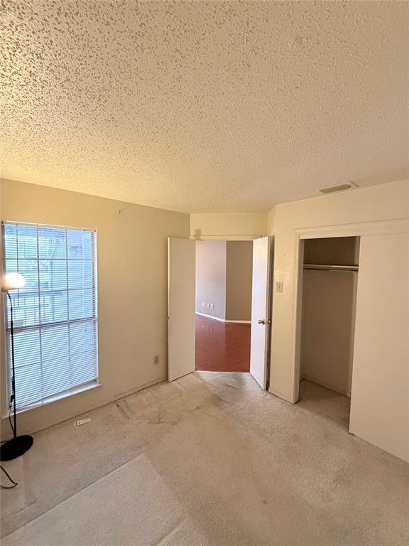 18333 Roehampton Drive, Unit 622 Dallas, TX 75252 - Photo 10 of 28 a view of livingroom with an empty space