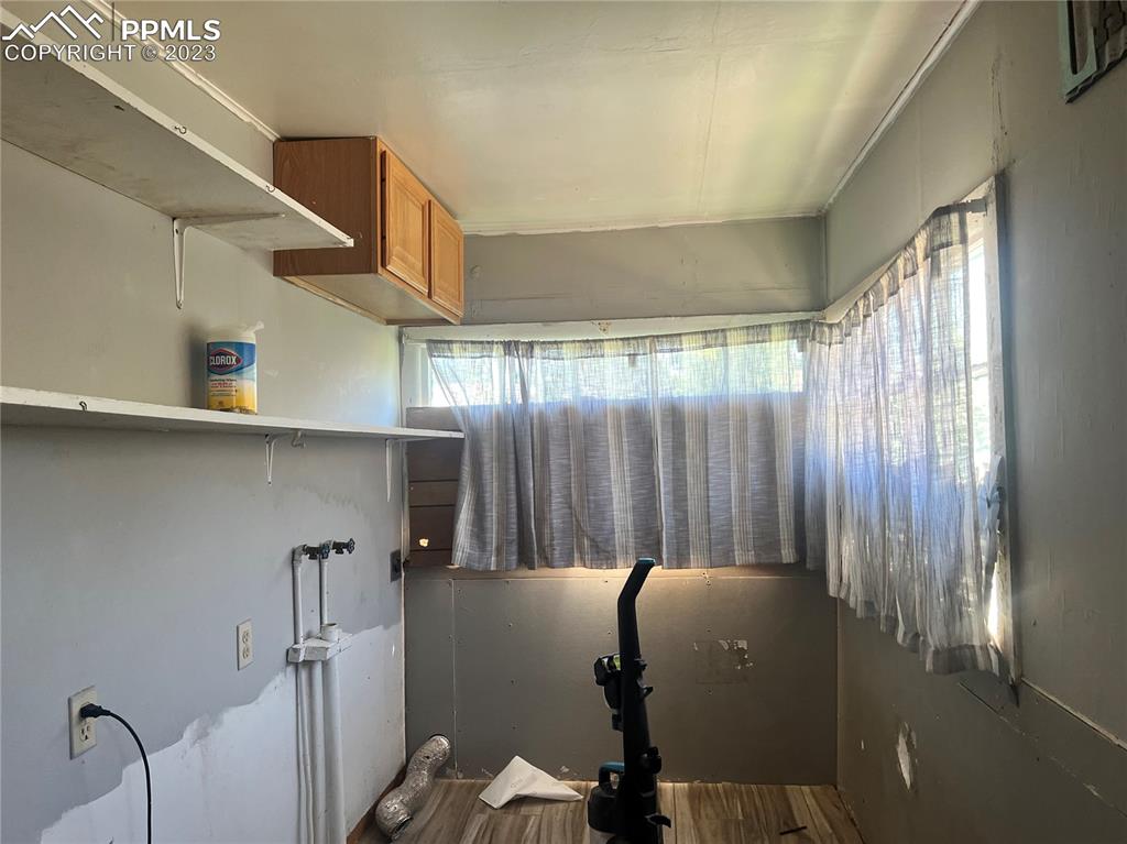 955 Golden Street Calhan, CO 80808 - Photo 19 of 25 a bathroom with a sink and mirror