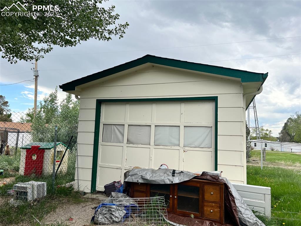 955 Golden Street Calhan, CO 80808 - Photo 3 of 25 a front view of a house with yard