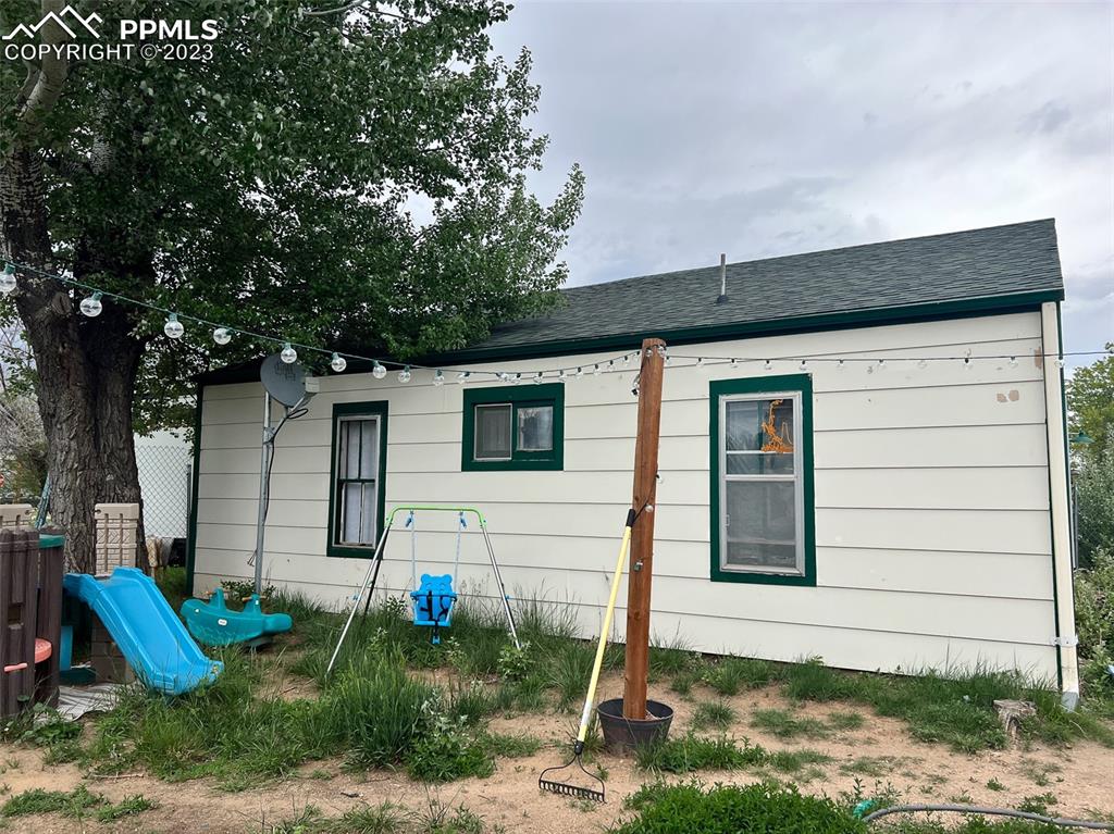 955 Golden Street Calhan, CO 80808 - Photo 7 of 25 a view of a house with backyard and sitting area