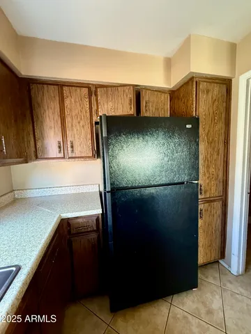 a kitchen with a sink and a stove