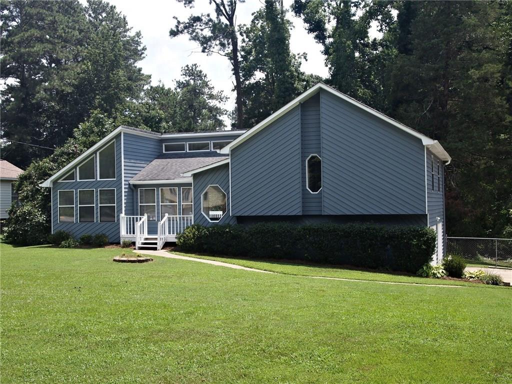 103 Partridge Ridge Woodstock, GA 30188 - Photo 1 of 1 3 BR, 2 Bath on over 1/2 acre. Location! Location!