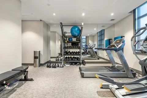 a view of a room with gym equipment