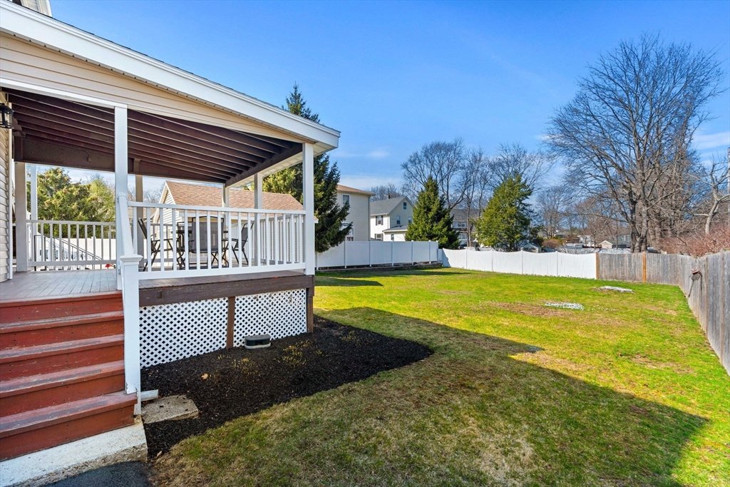 12 Chestnut Street Danvers, MA 01923 - Photo 11 of 25 a view of swimming pool with deck and garden