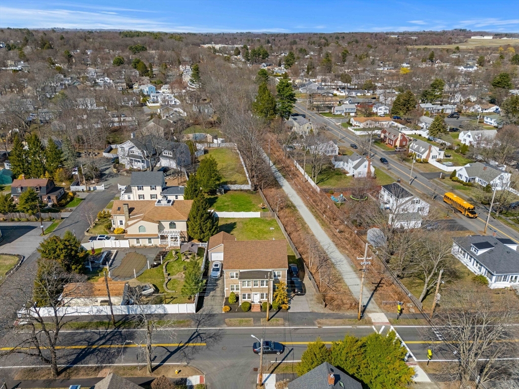 12 Chestnut Street Danvers, MA 01923 - Photo 22 of 25 an aerial view of residential houses with outdoor space