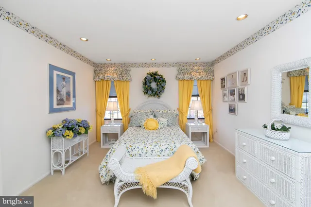 a bedroom with furniture and a table