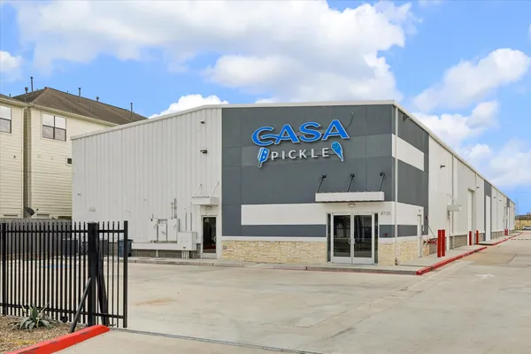 a view of a building with a street