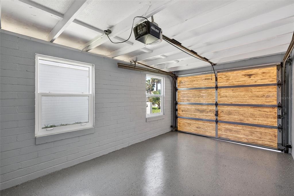 47 Carol Road Ormond Beach, FL 32176 - Photo 34 of 54 an empty room with wooden floor and windows