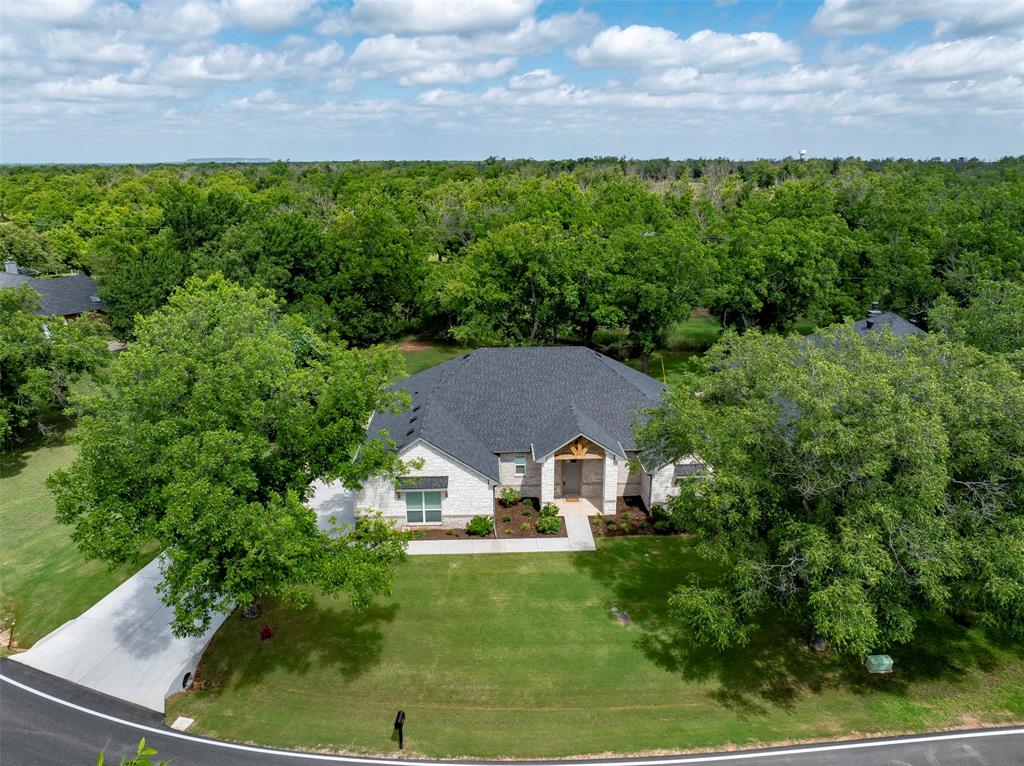 10301 Ravenswood Road Granbury, TX 76049 - Photo 1 of 38 Home backs up to pecan orchard