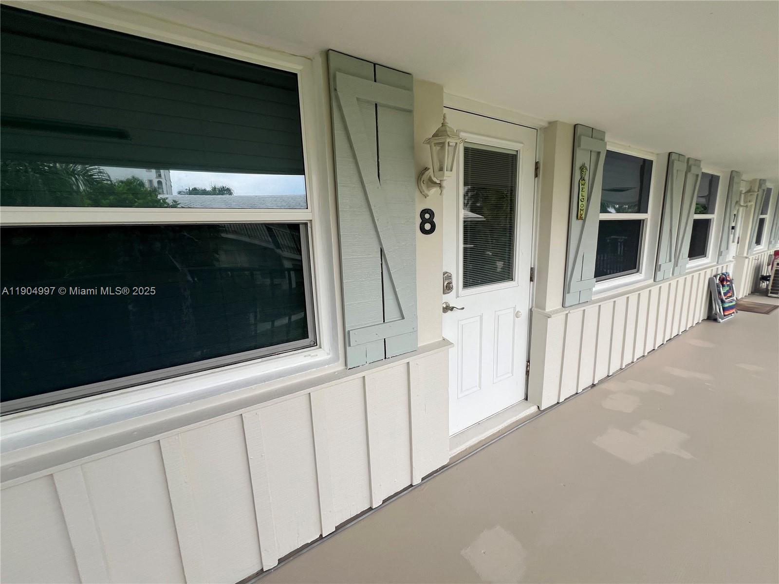 108 Bravado Lane, Unit 8 Palm Beach Shores, FL 33404 - Photo 15 of 17 a view of front door