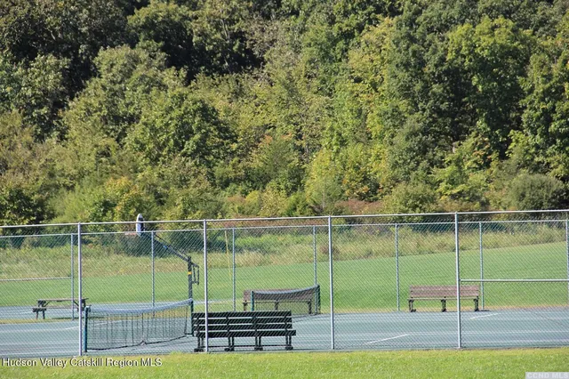 a view of a lake with a yard
