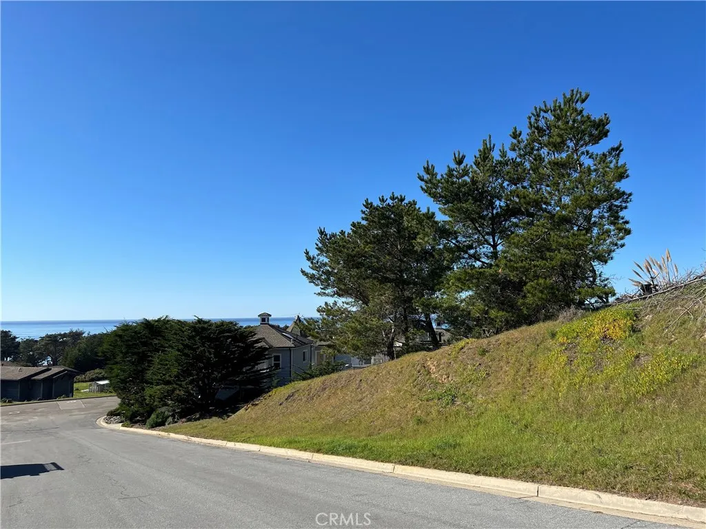 0 Chelsea Lane Cambria, CA 93428 - Photo 18 of 20 a view of a road with a building in the background