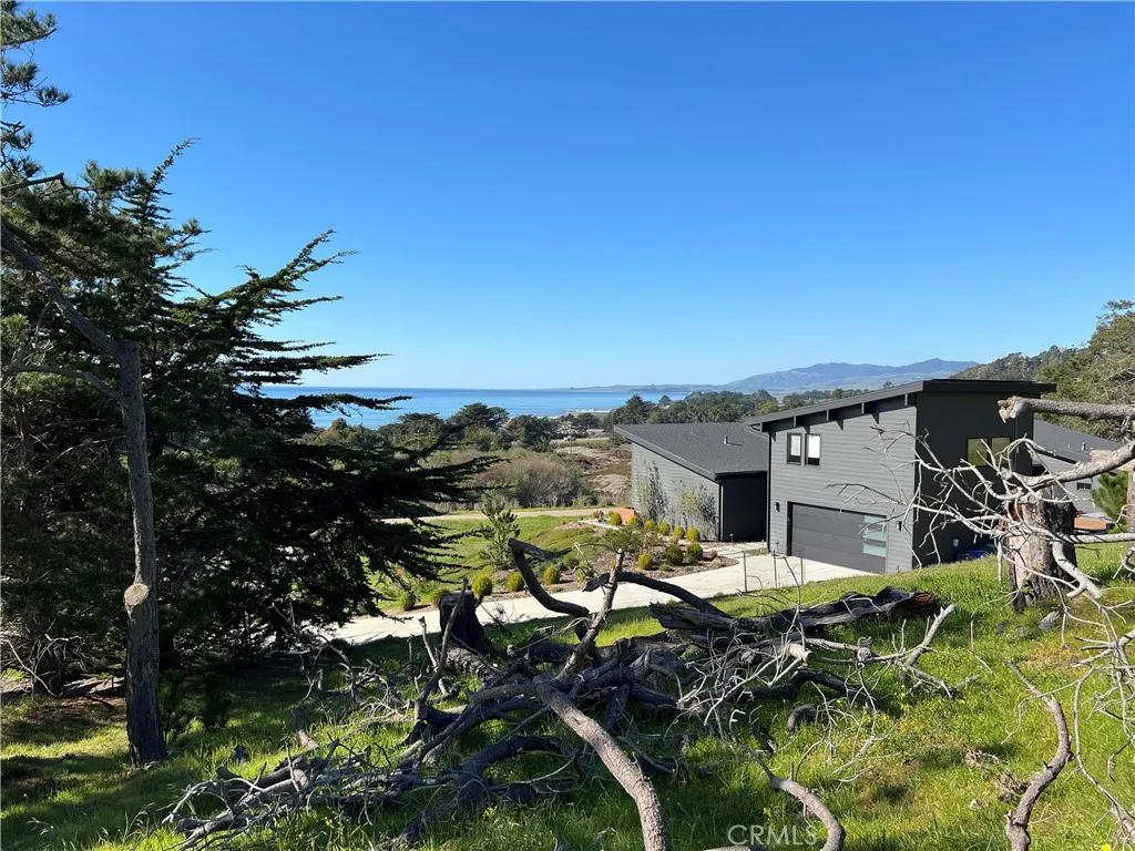 0 Chelsea Lane Cambria, CA 93428 - Photo 4 of 20 a backyard of a house with table and chairs