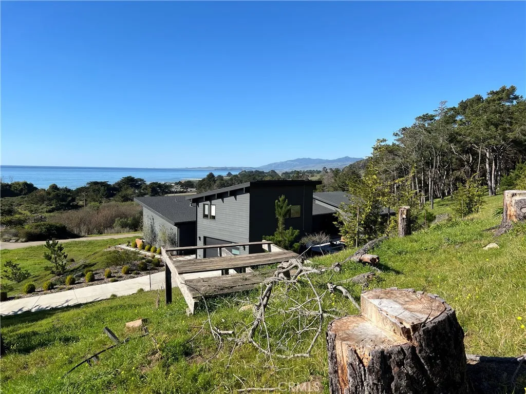 0 Chelsea Lane Cambria, CA 93428 - Photo 5 of 20 a swimming pool with outdoor seating and yard