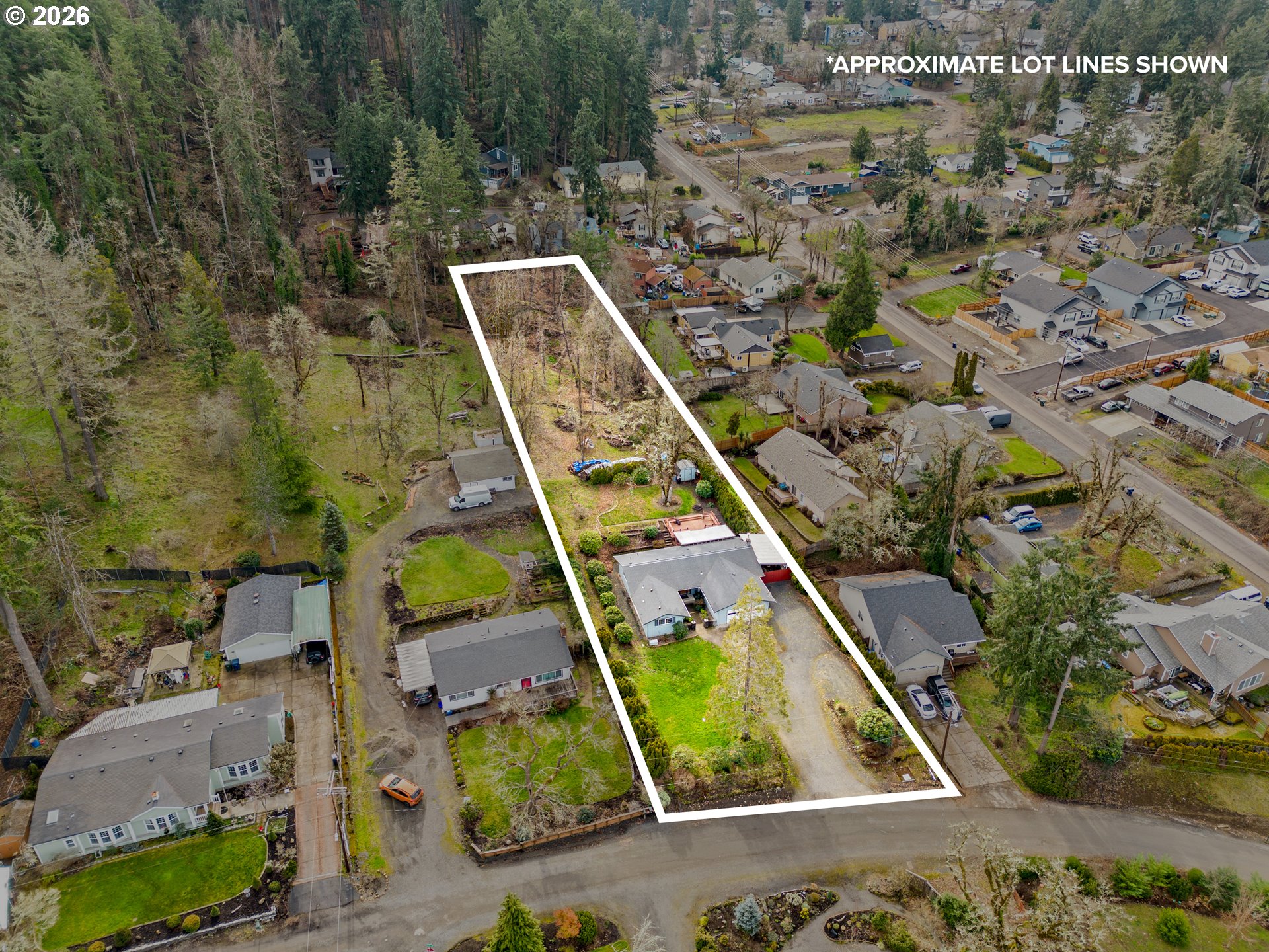 7027 South E Street Springfield, OR 97478 - Photo 2 of 39 an aerial view of residential houses with outdoor space