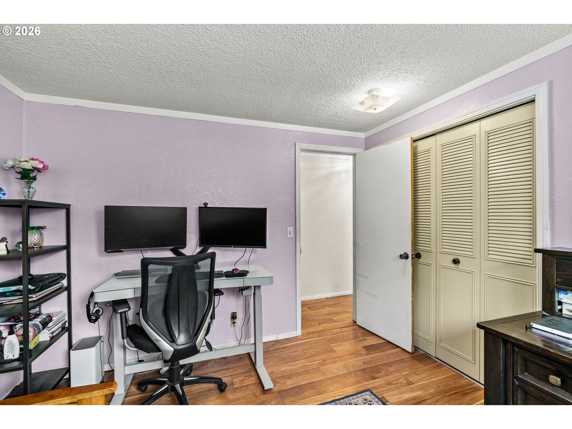7027 South E Street Springfield, OR 97478 - Photo 22 of 39 a view of workspace with livingroom view