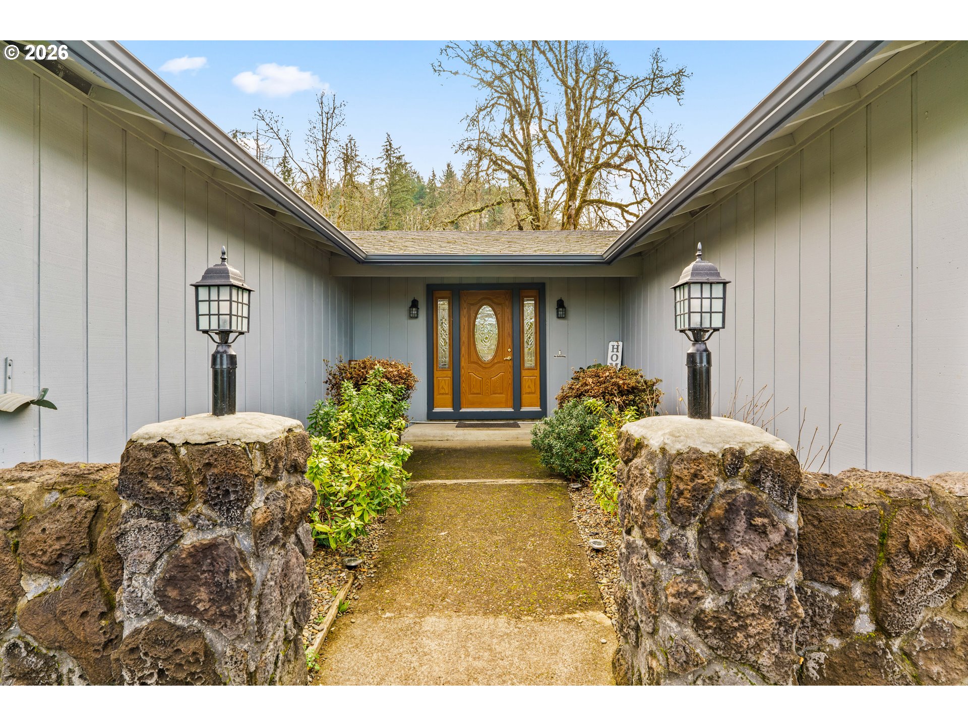 7027 South E Street Springfield, OR 97478 - Photo 4 of 39 a view of a porch with a yard