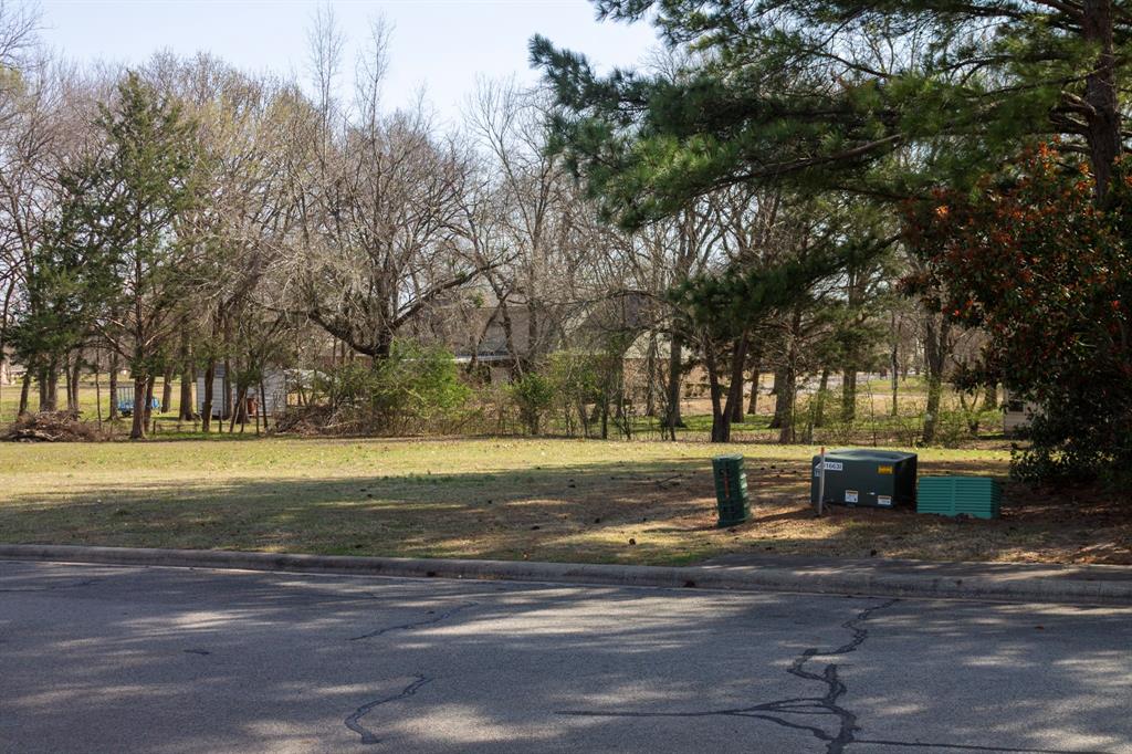 1000 Legend Avenue Bonham, TX 75418 - Photo 7 of 11 a view of a park with large trees