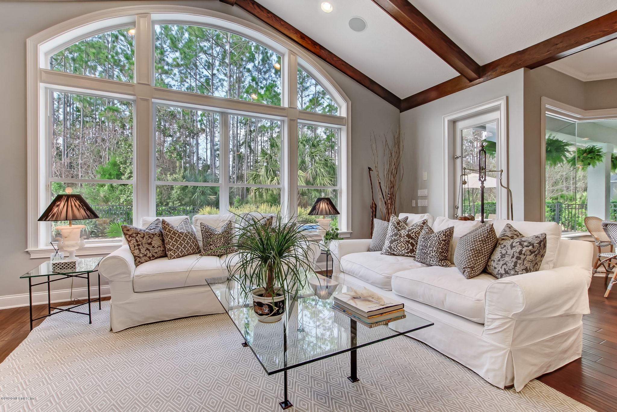 28 Lighthouse Point Circle Ponte Vedra, FL 32081 - Photo 16 of 108 a living room with furniture and a large window