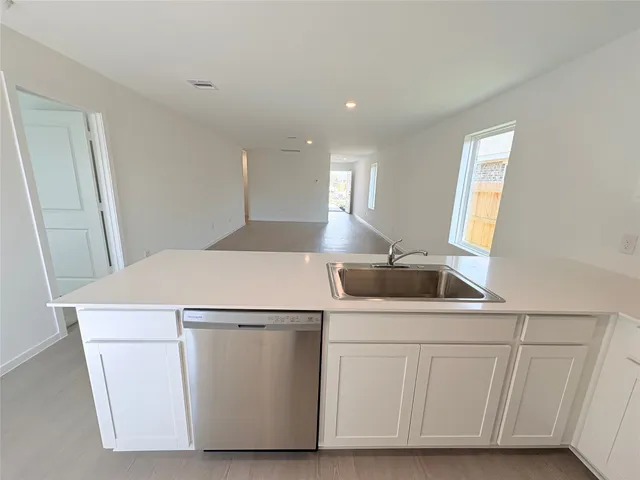 a utility room with washer and dryer