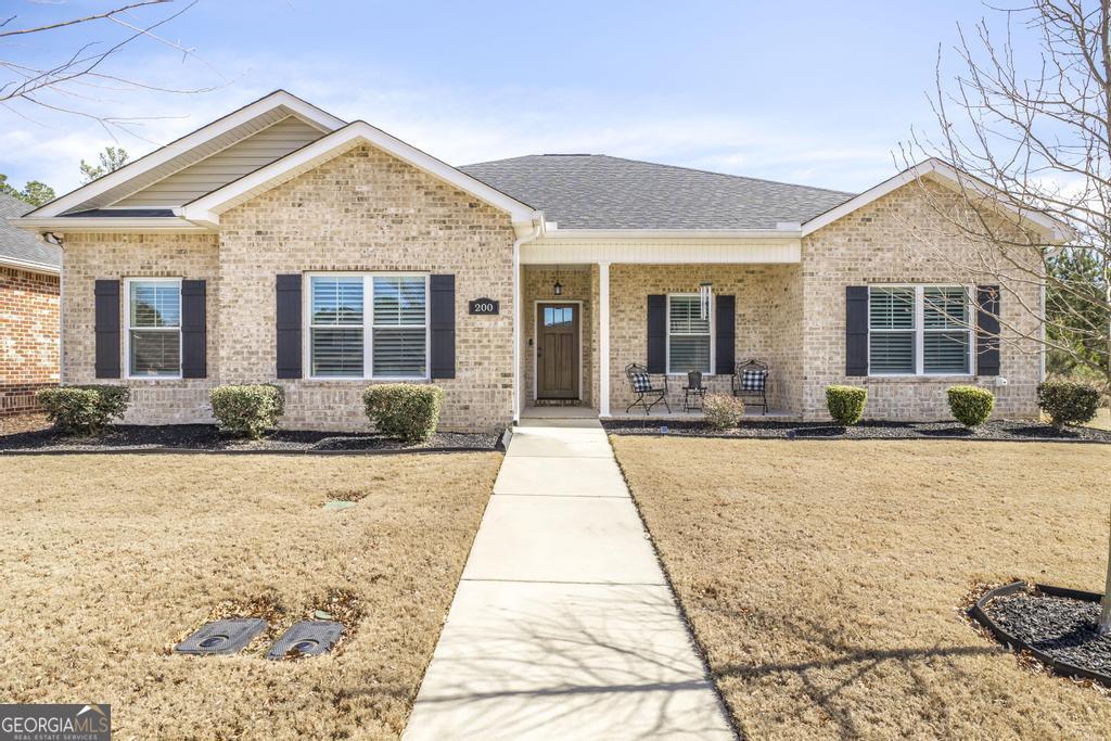 200 Charles Gray Boulevard Perry, GA 31069 - Photo 1 of 1 a view of a house with snow on the floor