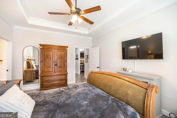 a bathroom with a double vanity sink and mirror with shower