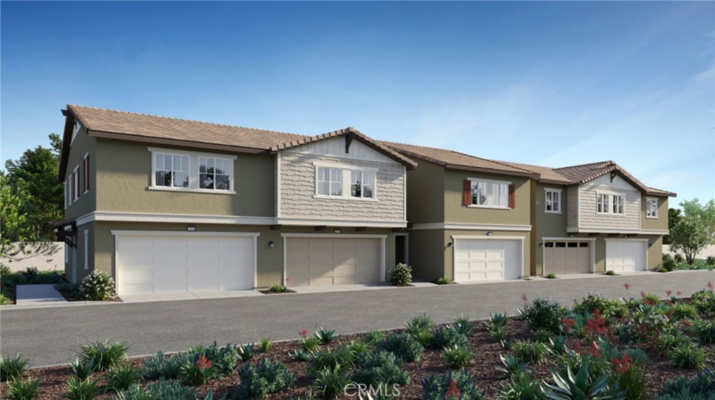 19249 Beech Grv Street Riverside, CA 92507 - Photo 11 of 19 a front view of a house with garage