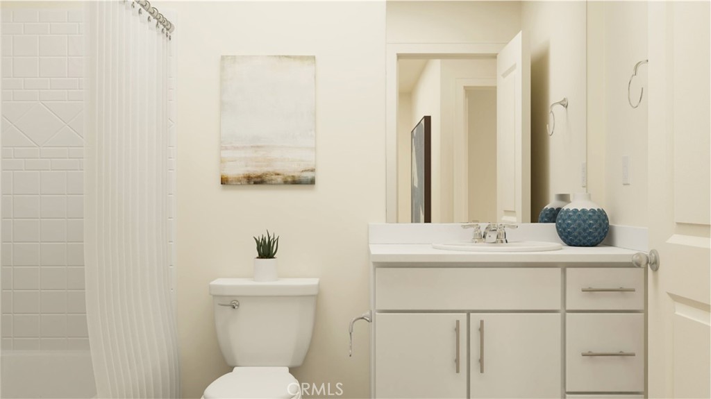 19249 Beech Grv Street Riverside, CA 92507 - Photo 7 of 19 a bathroom with a sink and a toilet
