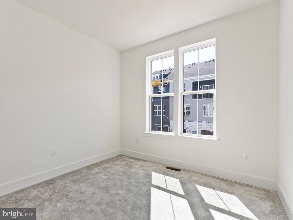 6105 Vivaldi Road Princeton, NJ 08540 - Photo 18 of 28 an empty room with windows