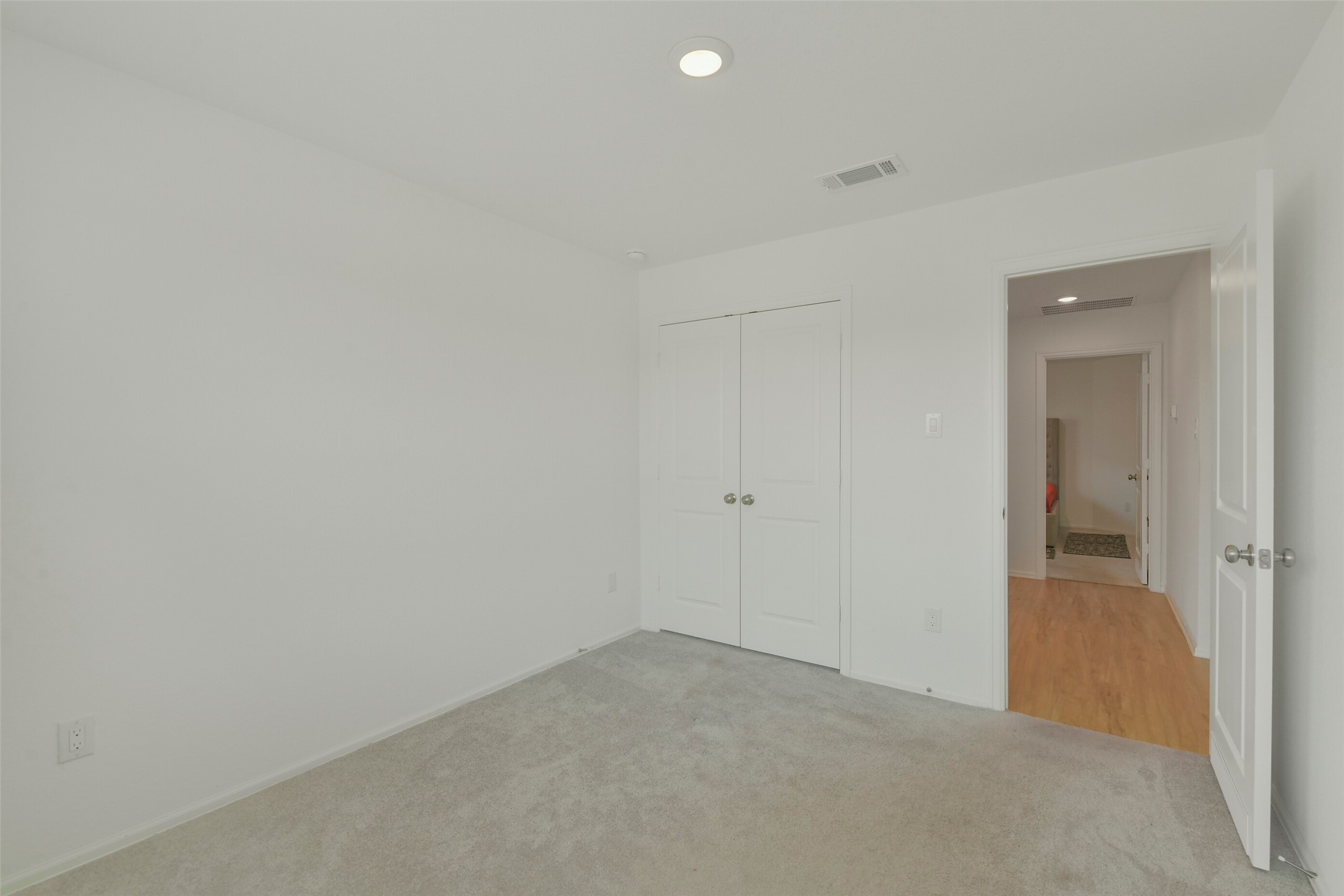 13978 Manatee Street Splendora, TX 77372 - Photo 9 of 39 Comfortable secondary bedroom with closet and natural light.