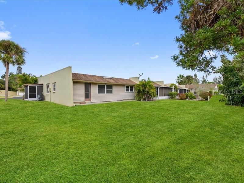 1941 Settlement Road, Unit 11 Venice, FL 34285 - Photo 2 of 39 a front view of house with a garden