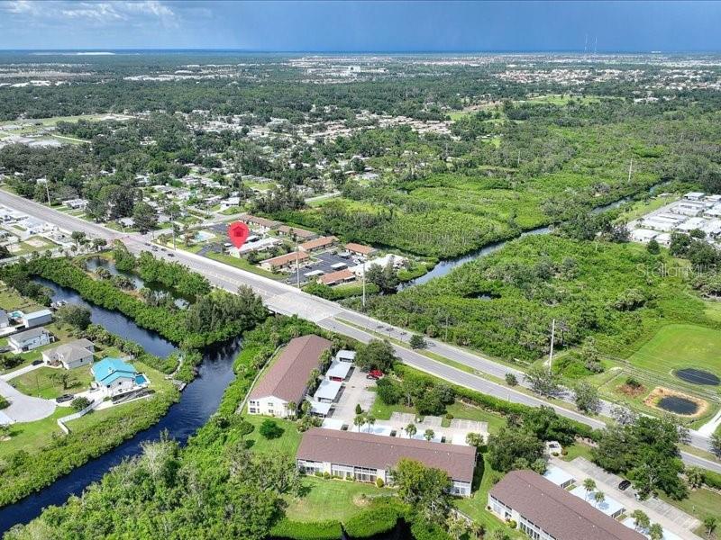 1941 Settlement Road, Unit 11 Venice, FL 34285 - Photo 34 of 39 an aerial view of a city