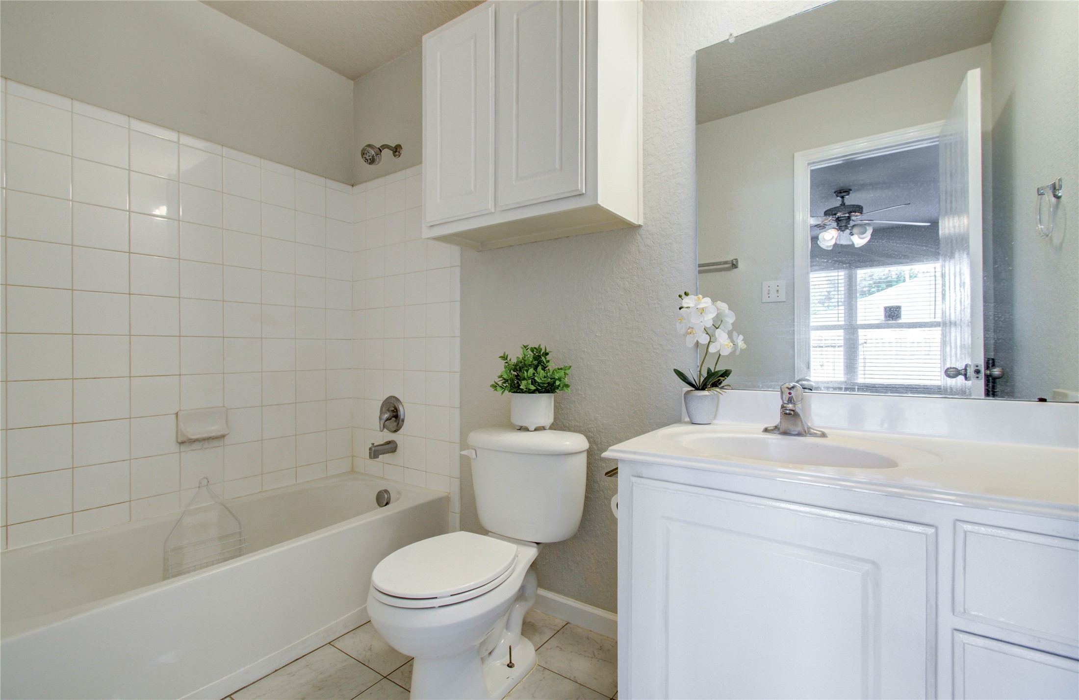 13231 Ridgewood Knoll Lane Houston, TX 77047 - Photo 16 of 23 a bathroom with a sink toilet and shower