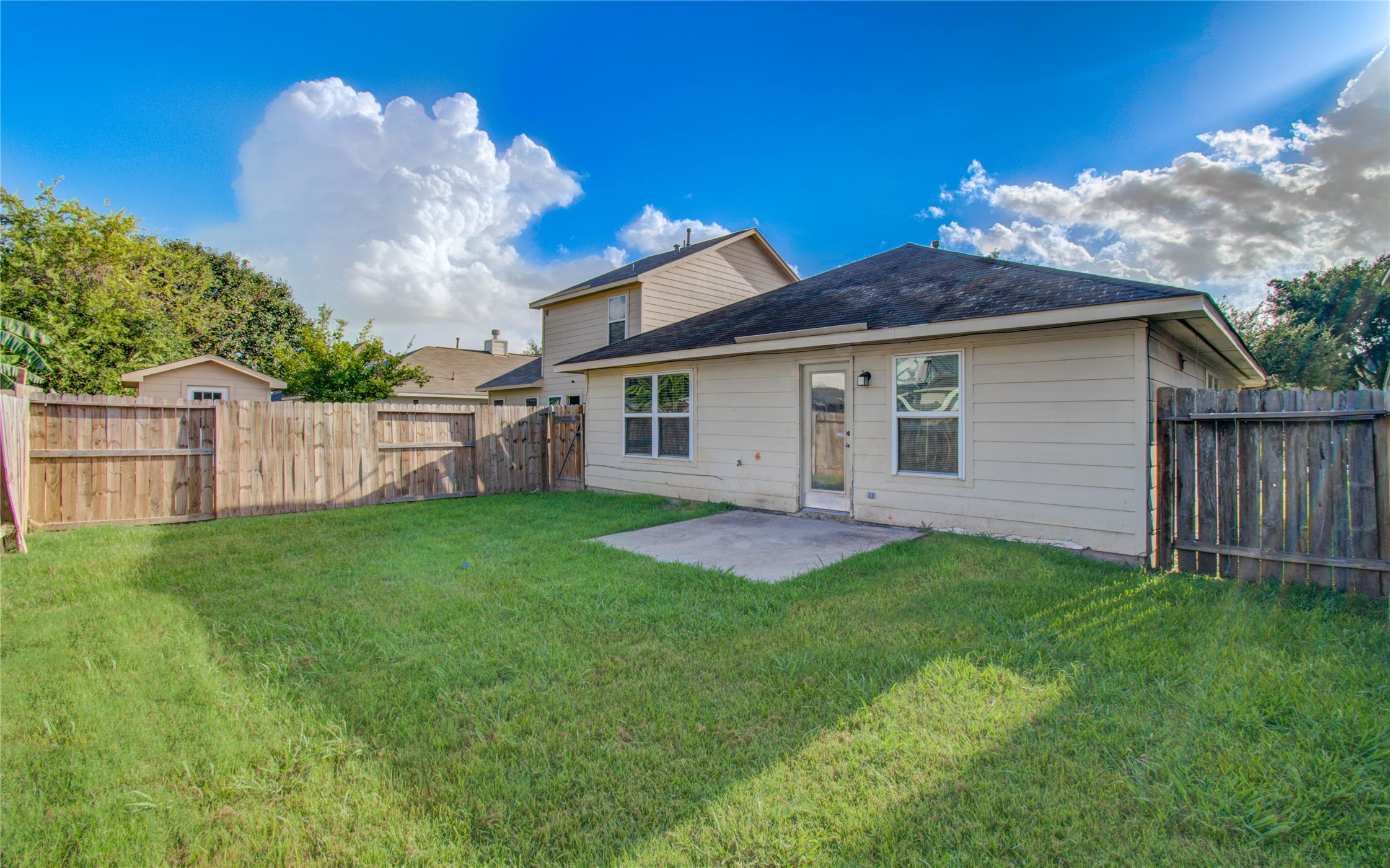 13231 Ridgewood Knoll Lane Houston, TX 77047 - Photo 23 of 23 a view of a house with yard and a garden