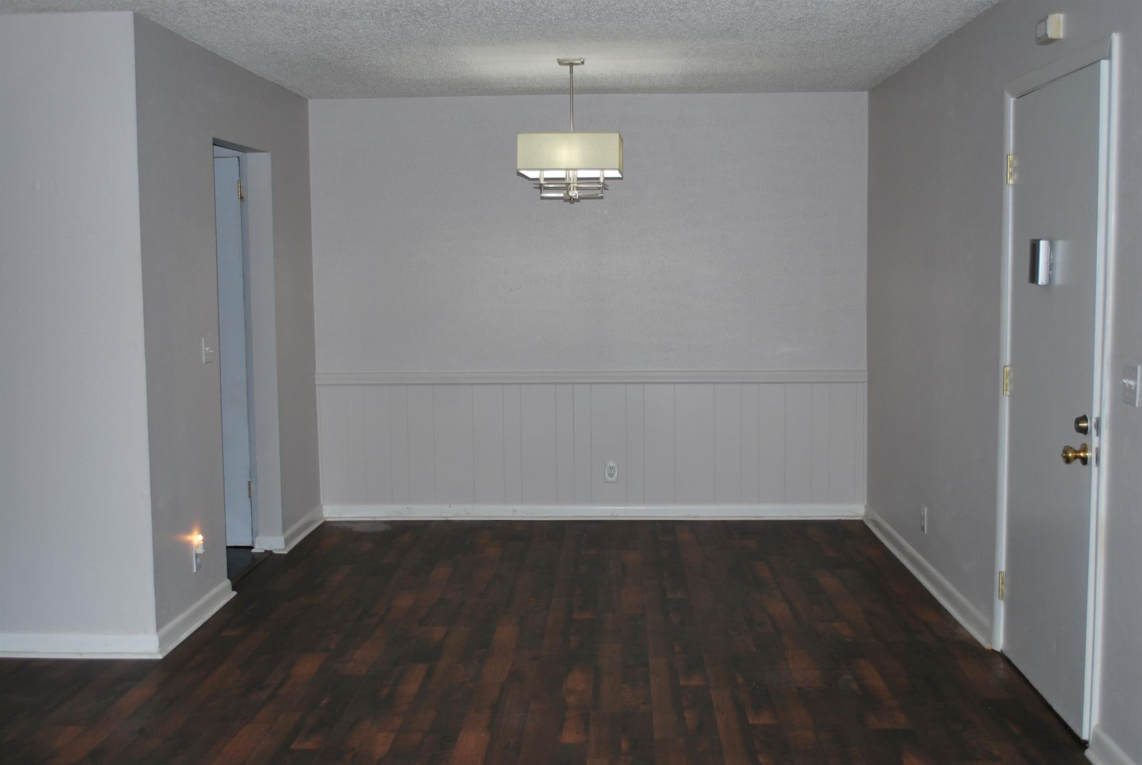 21 Vaughns Gap Road Nashville, TN 37205 - Photo 6 of 12 a view of an empty room and wooden floor