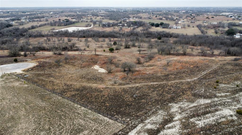 7901 Whispering Meadows Road Joshua, TX 76058 - Photo 2 of 3 an aerial view of residential houses with outdoor space