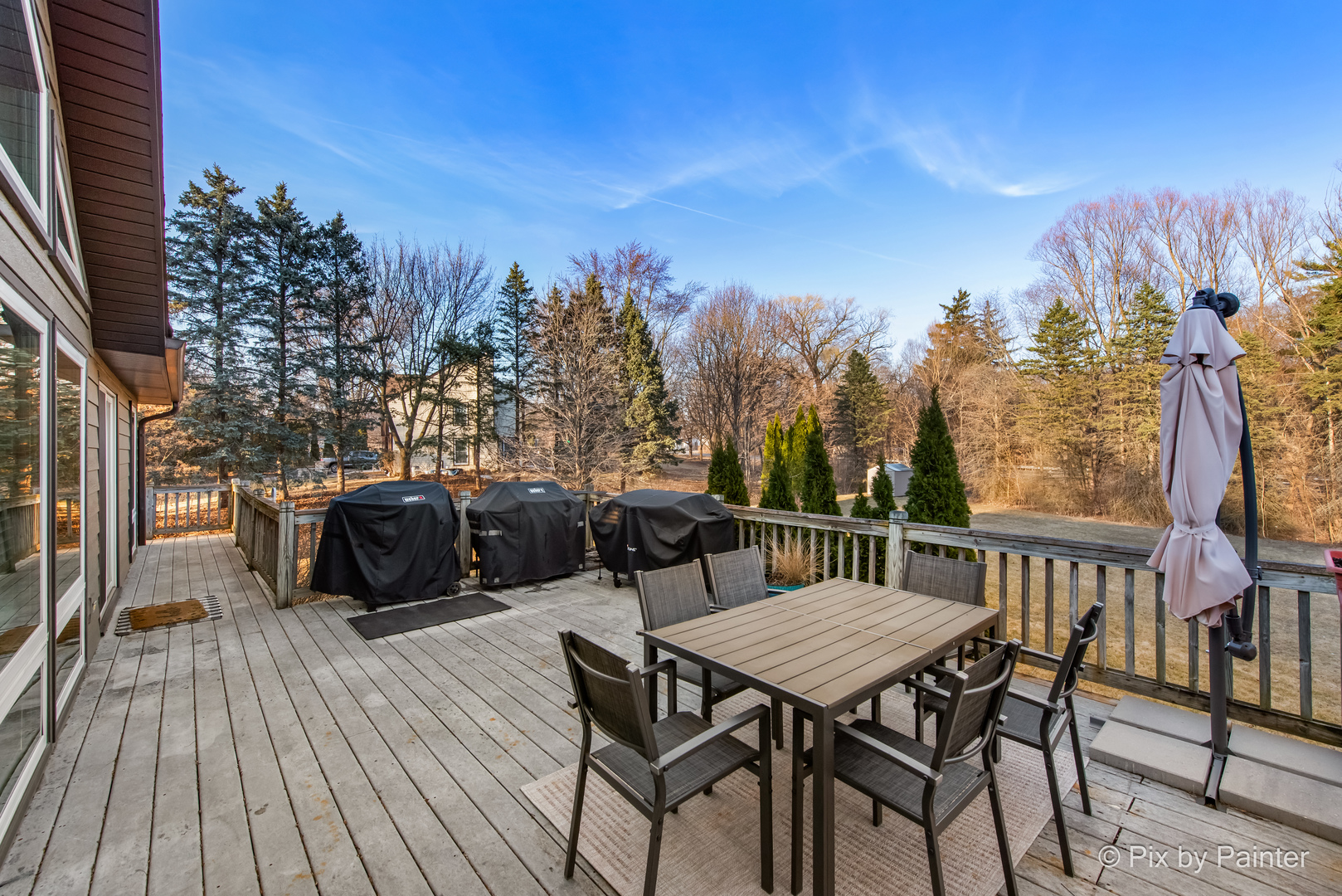 3134 Chellington Drive Johnsburg, IL 60051 - Photo 6 of 41 a view of a chairs and table on the deck