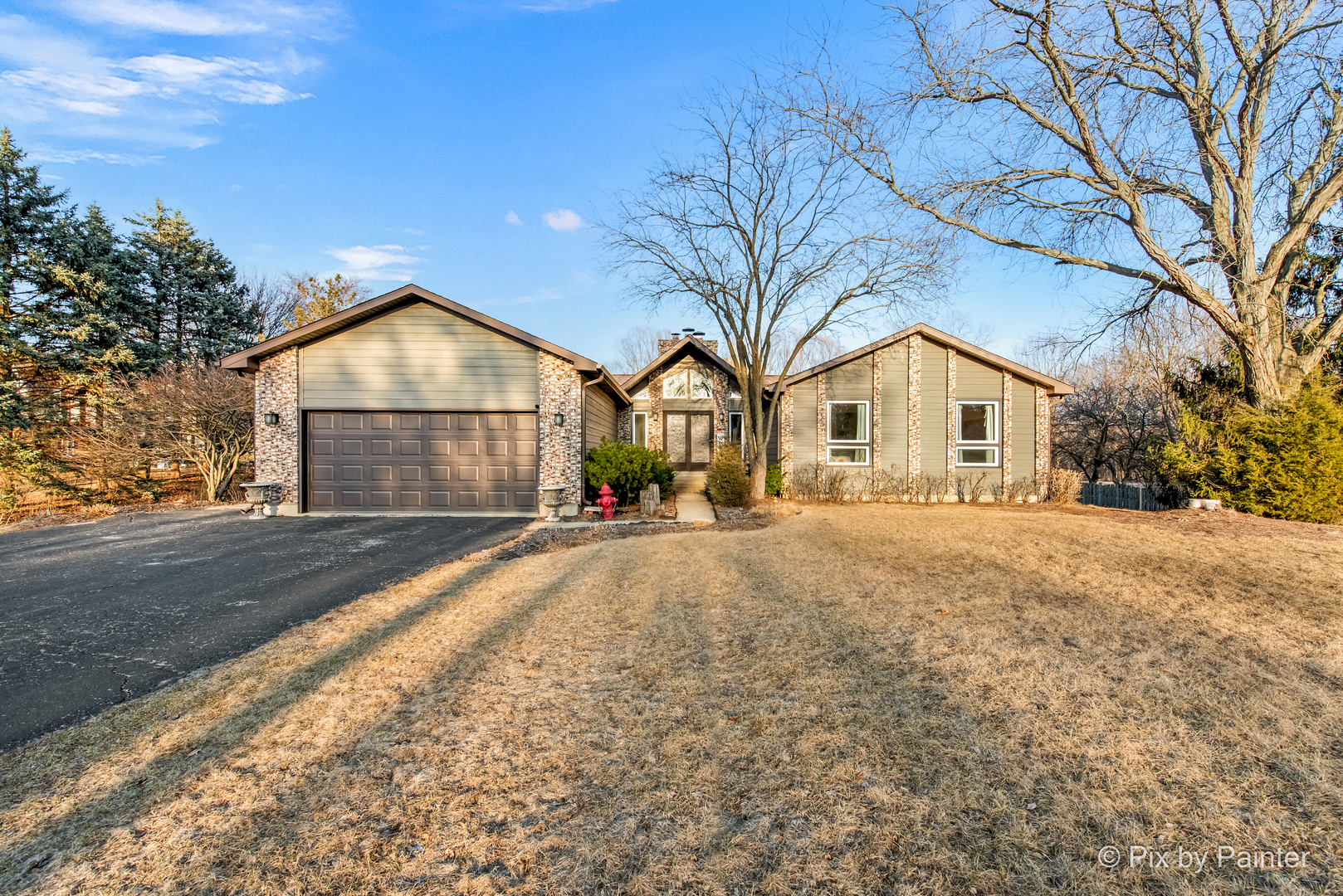3134 Chellington Drive Johnsburg, IL 60051 - Photo 8 of 41 a view of house with snow on the road