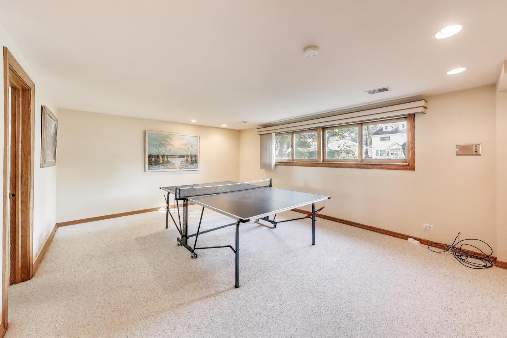 804 Euclid Avenue Elmhurst, IL 60126 - Photo 17 of 28 a view of a livingroom with furniture and a window