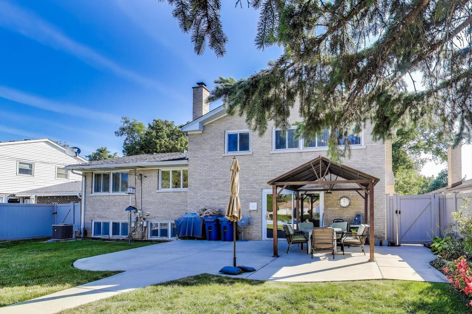 804 Euclid Avenue Elmhurst, IL 60126 - Photo 20 of 28 a view of a house with a yard porch and sitting area