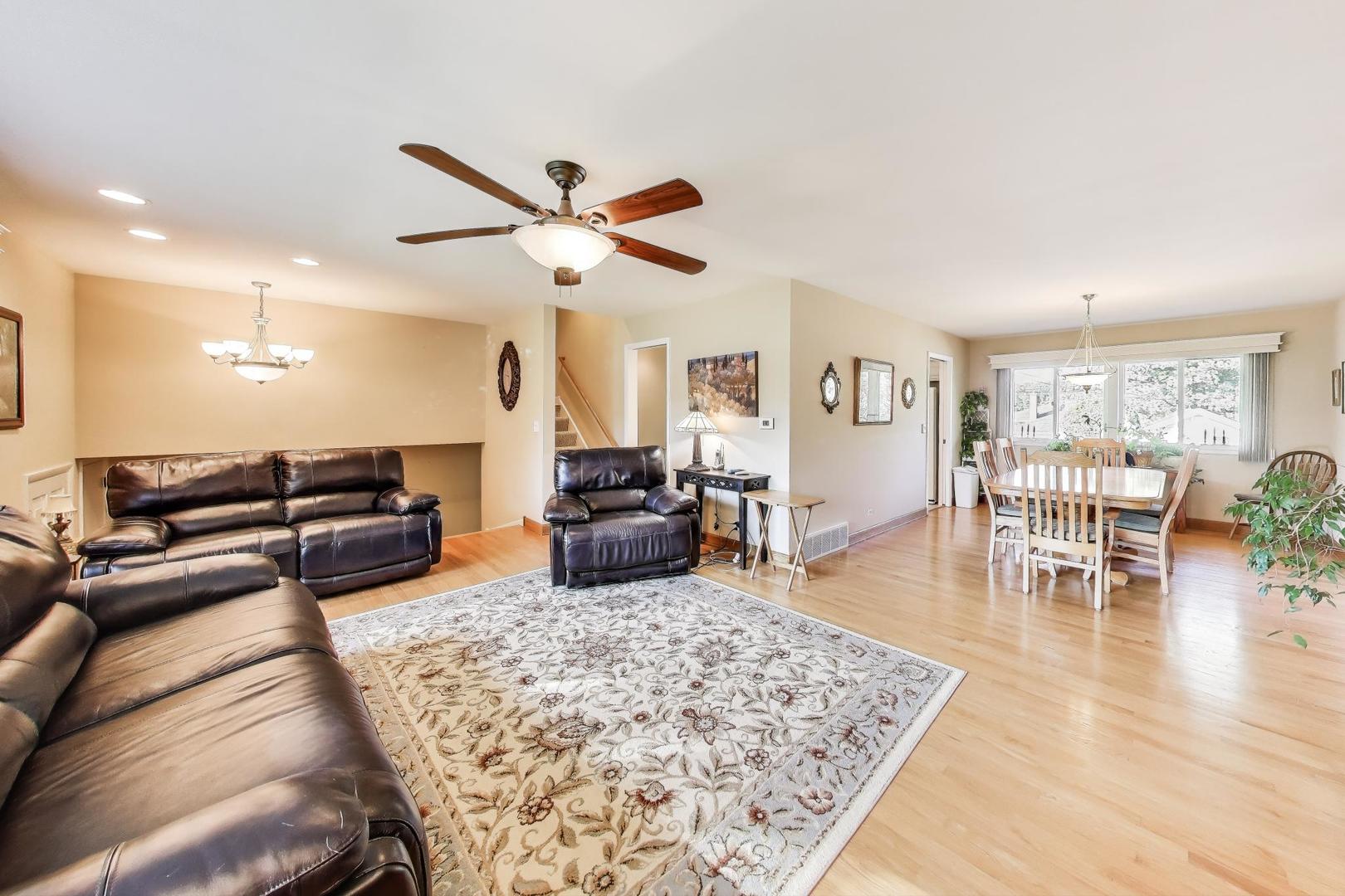 804 Euclid Avenue Elmhurst, IL 60126 - Photo 5 of 28 a living room with furniture and wooden floor