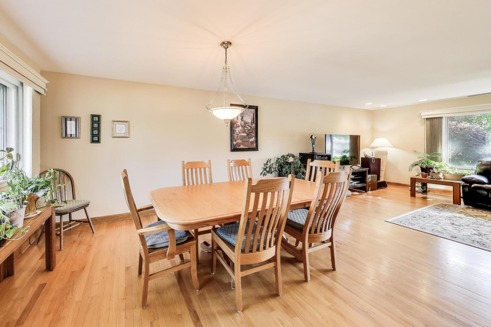 804 Euclid Avenue Elmhurst, IL 60126 - Photo 6 of 28 a dining room with furniture and wooden floor