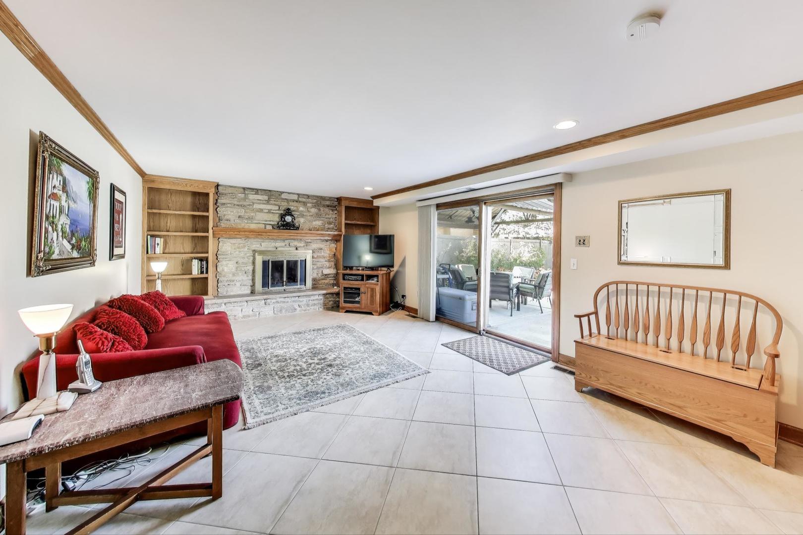 804 Euclid Avenue Elmhurst, IL 60126 - Photo 10 of 28 a spacious bedroom with a bed and a window