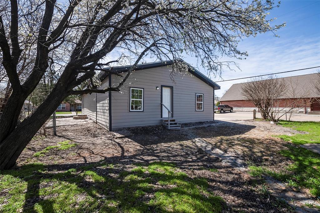 1101 Anthony Street McKinney, TX 75069 - Photo 26 of 26 a backyard of a house with lots of green space