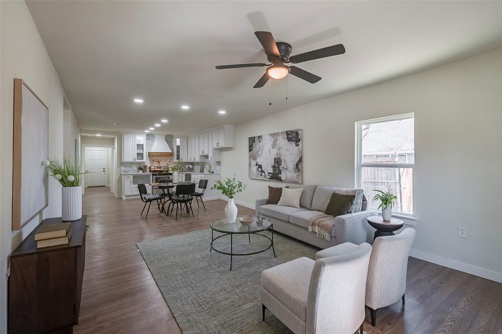 1101 Anthony Street McKinney, TX 75069 - Photo 4 of 26 a living room with furniture and a large window