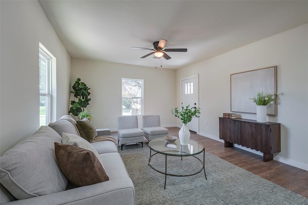 1101 Anthony Street McKinney, TX 75069 - Photo 6 of 26 a living room with furniture and a potted plant