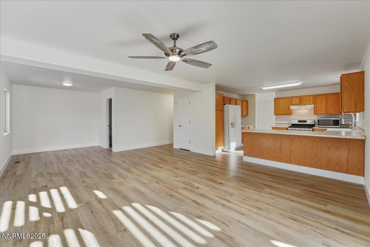 17598 Elk Court Reno, NV 89508 - Photo 17 of 43 a view of a kitchen with a sink and cabinets